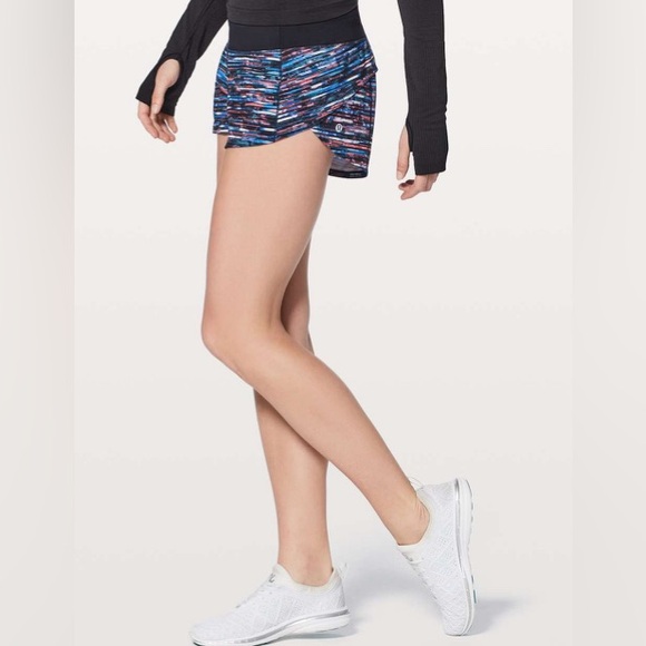 10601 -Lululemon Speed Up Short 2.5"
Hinshu Alpine White Multi / Black- size 10 - Picture 2 of 5